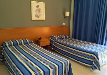 Quadruple Room (2 Adults + 2 Children)