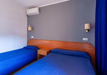 Habitación Cuádruple (2 adultos + 2 niños)